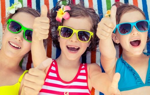 Happy Children In The Swimming Pool